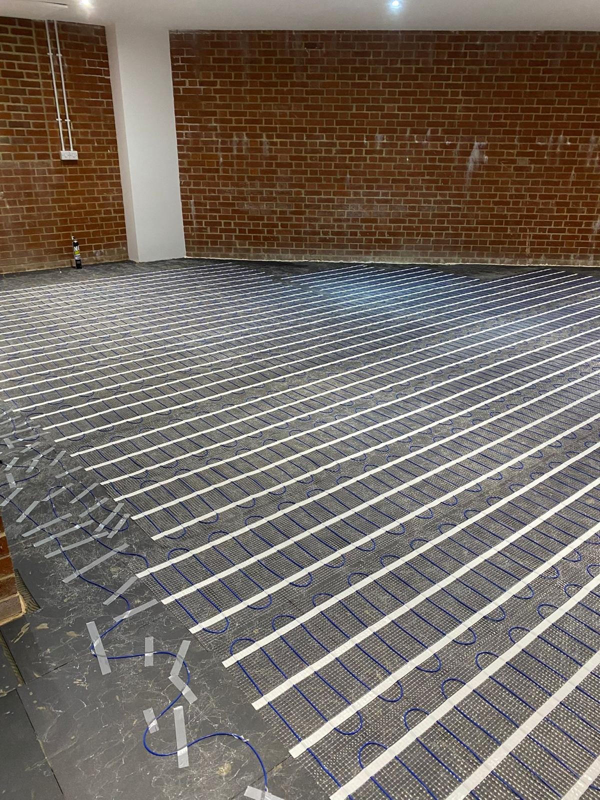 Electric underfloor heating installed in a London hotel lobby entrance
